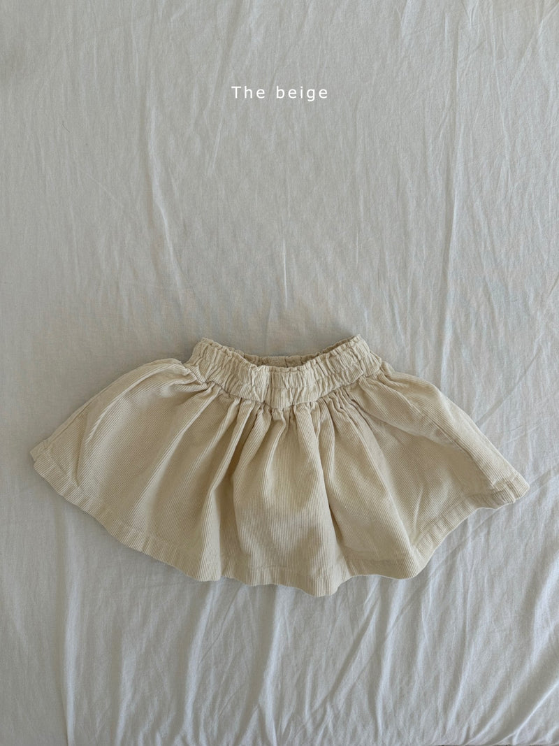 the beige / golden frill skirt