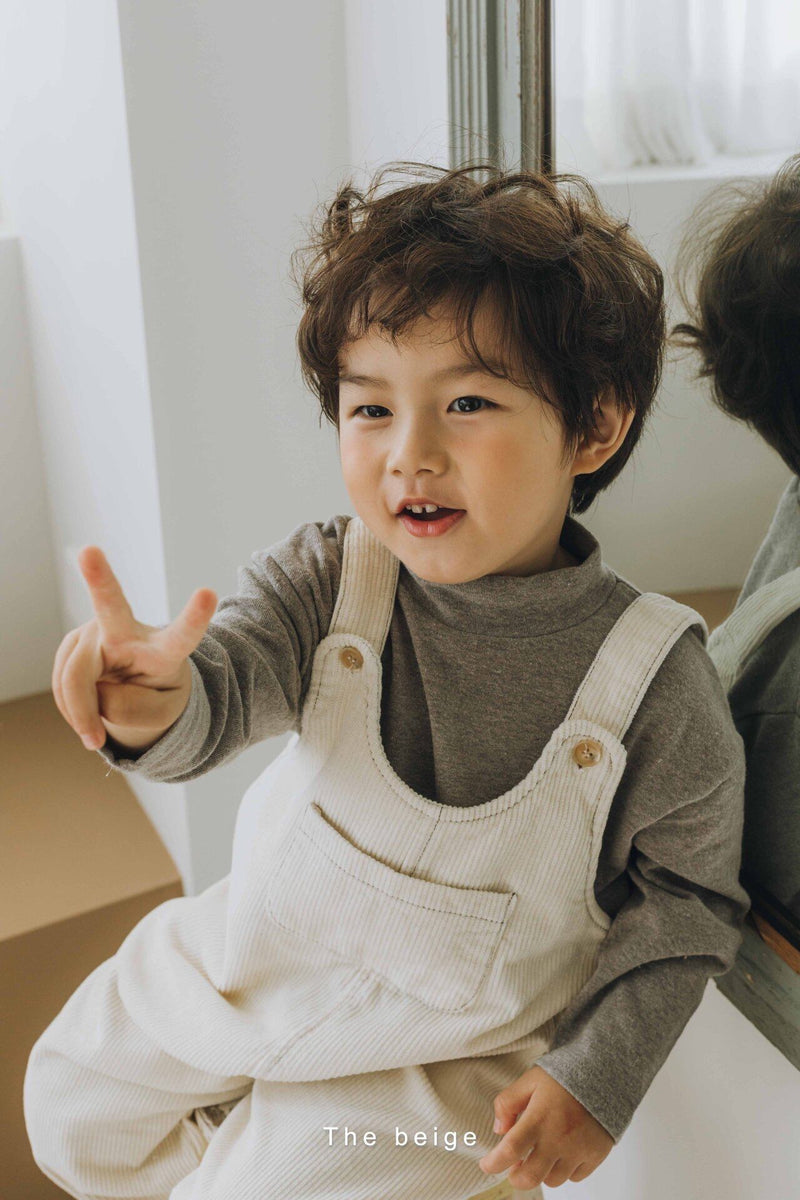 the beige / stitch overall