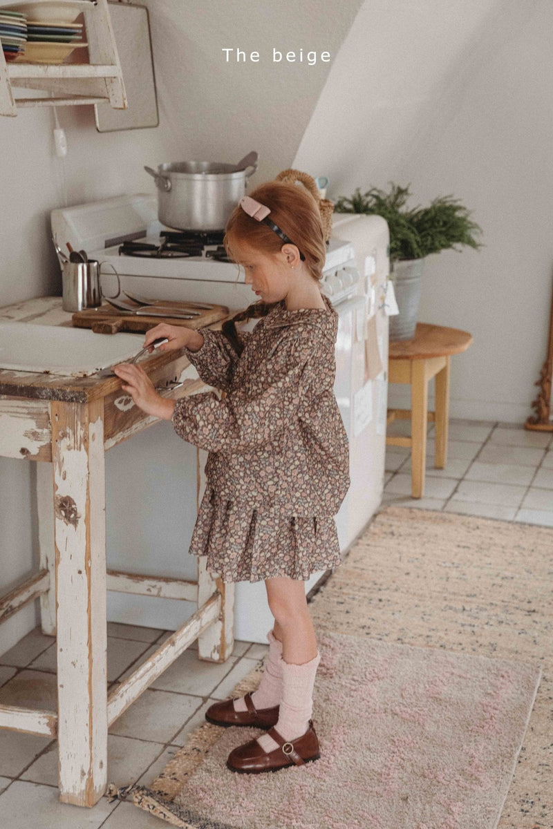 the beige / golden frill skirt