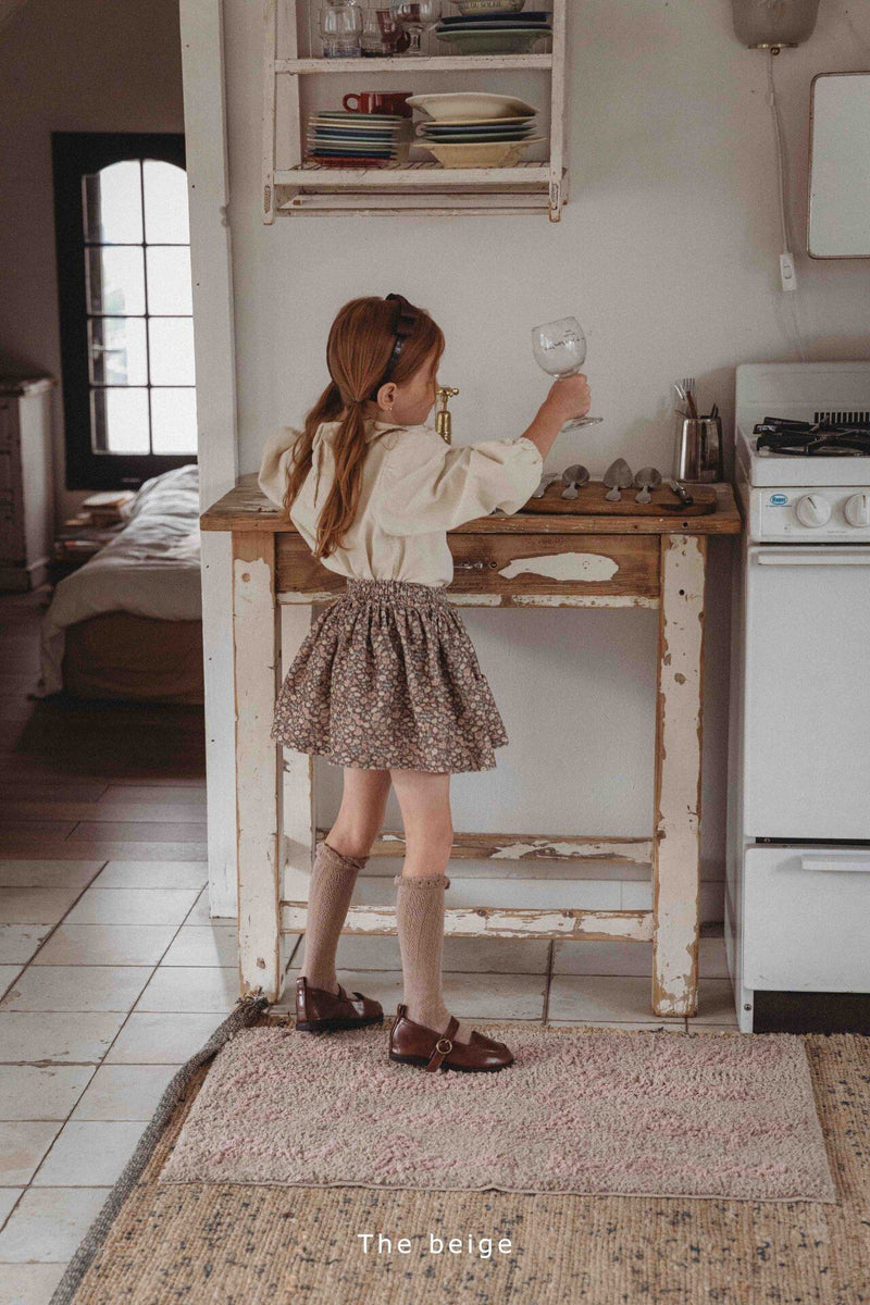 the beige / golden frill skirt