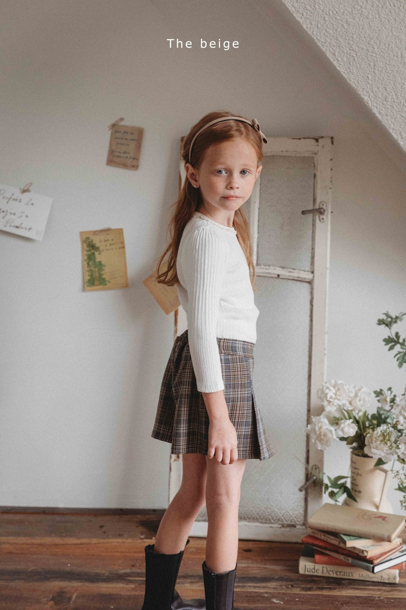 the beige / front pleated skirt pants