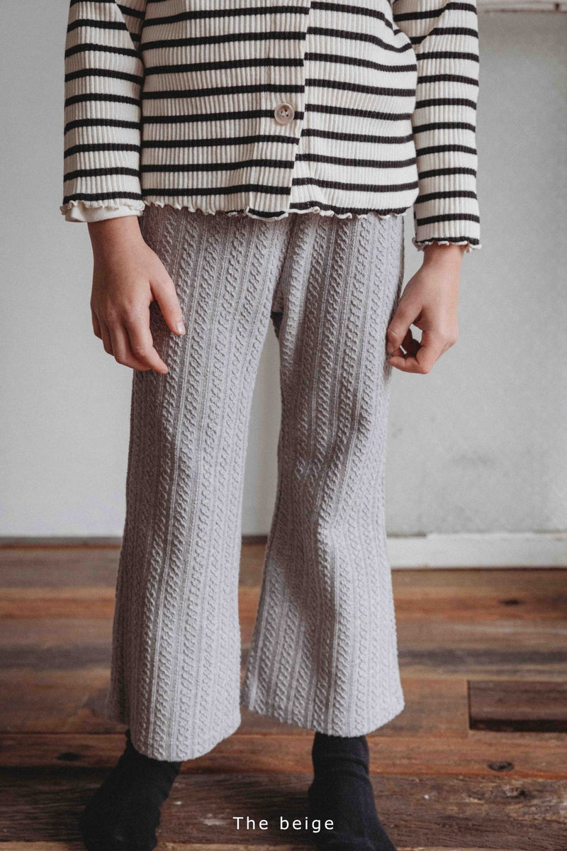 the beige / knitted bell-bottom pants