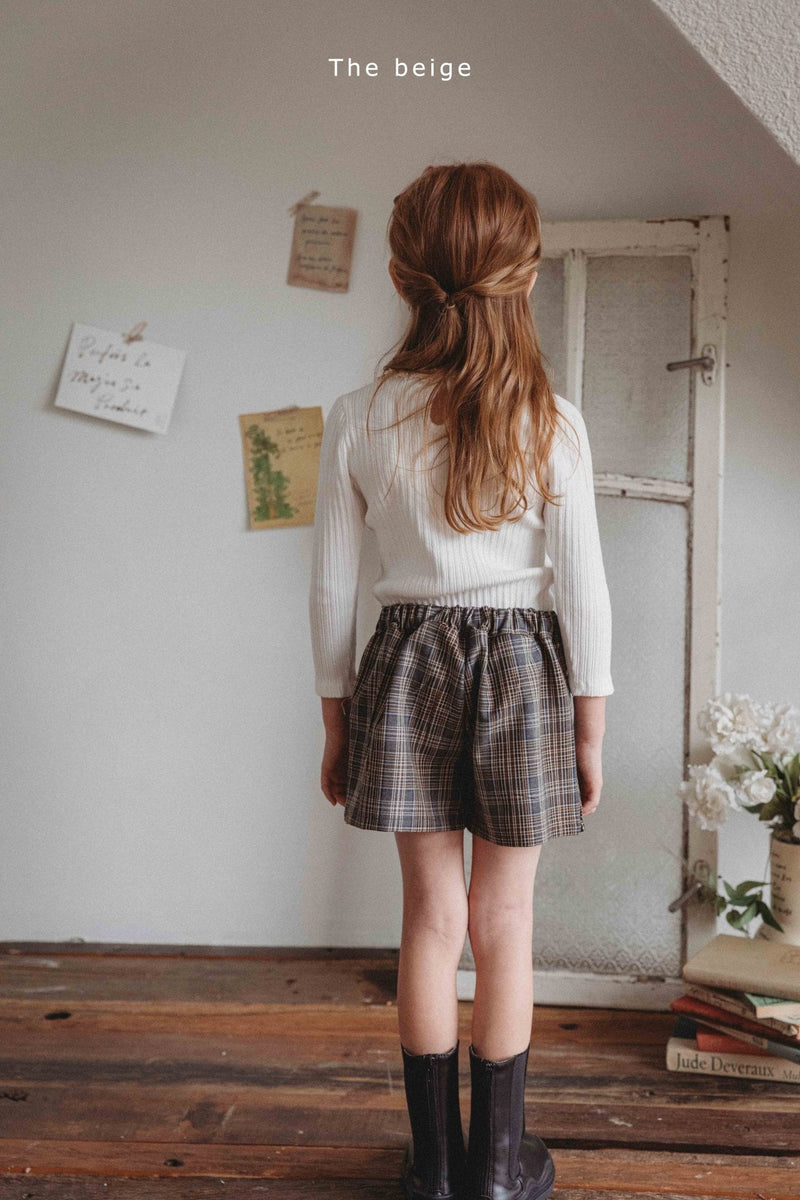 the beige / front pleated skirt pants