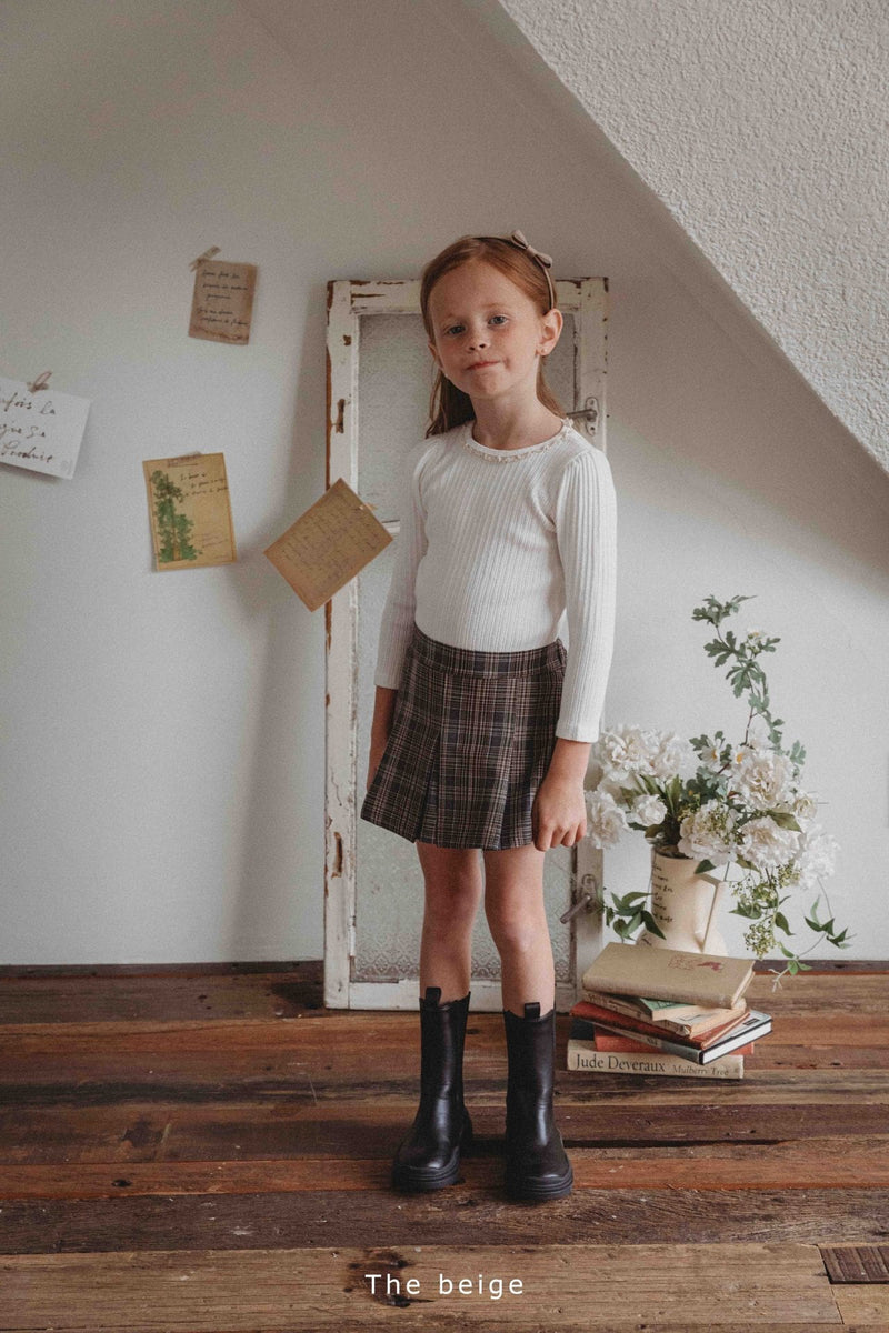 the beige / front pleated skirt pants