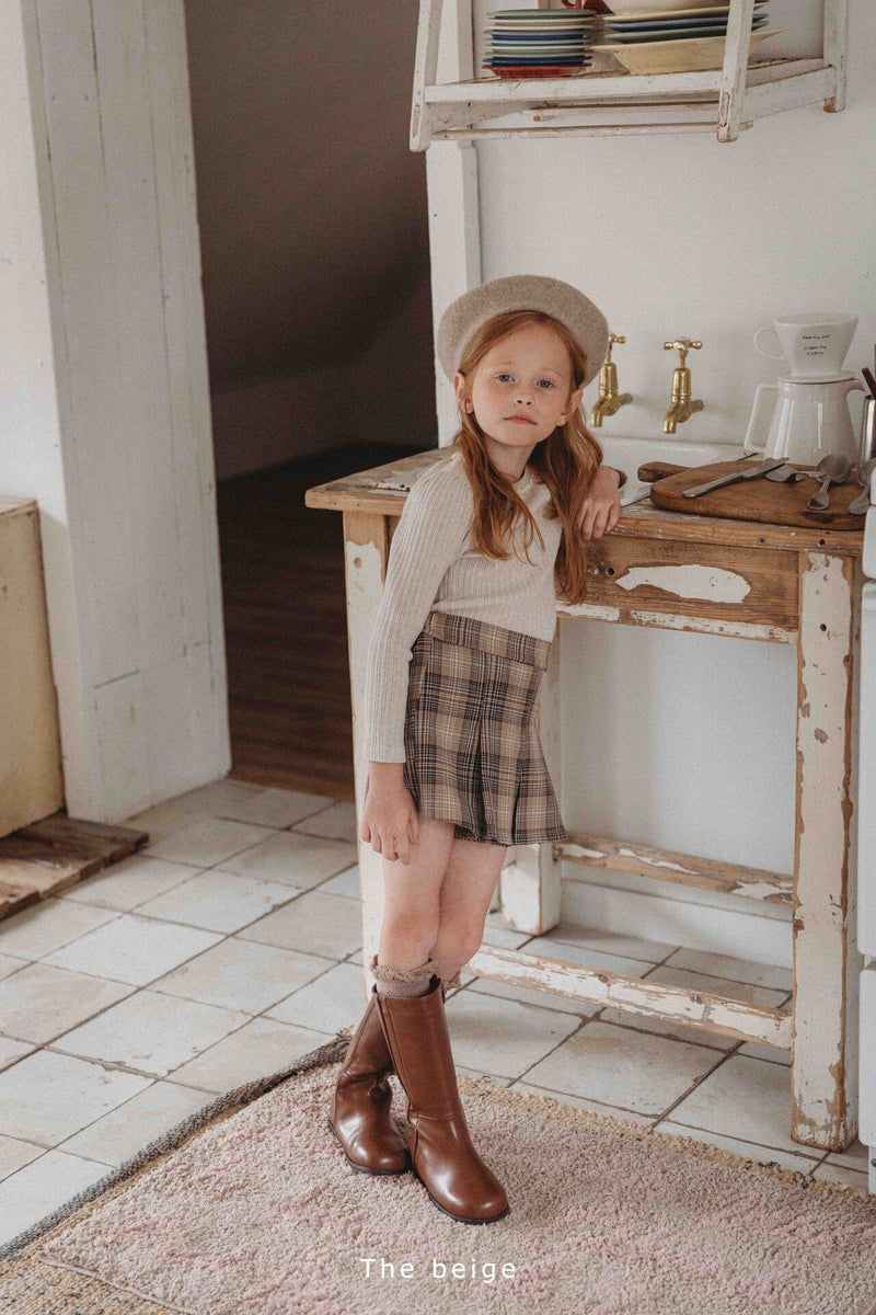 the beige / front pleated skirt pants