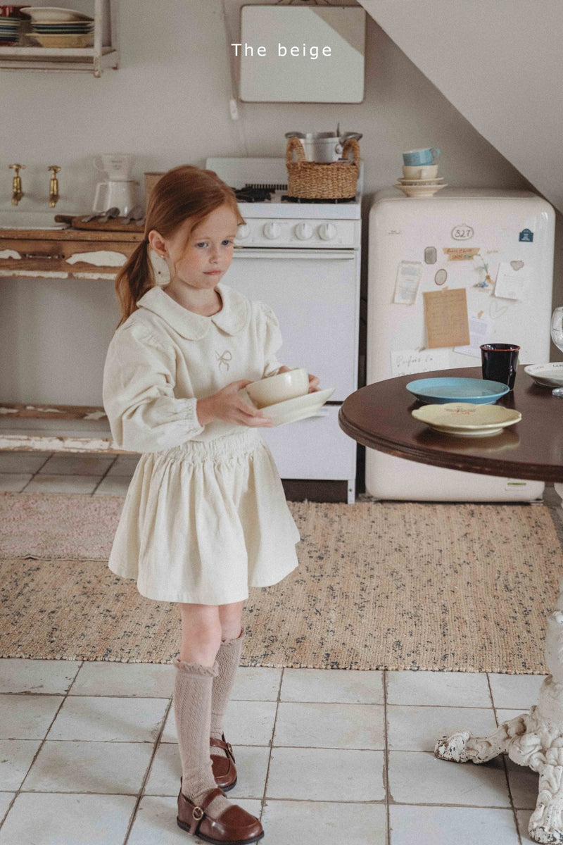 the beige / golden frill skirt