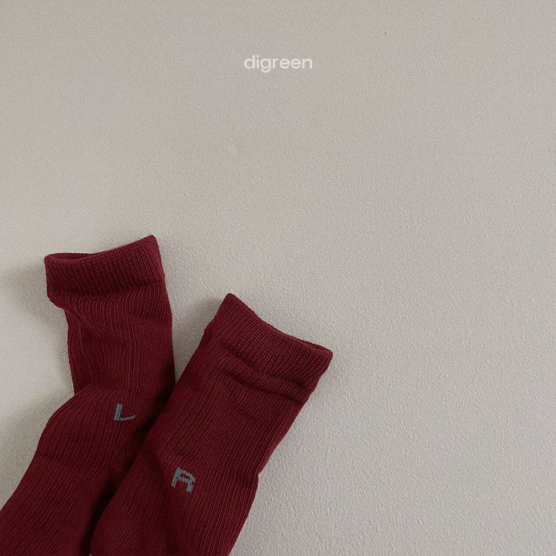 digreen /  left light socks